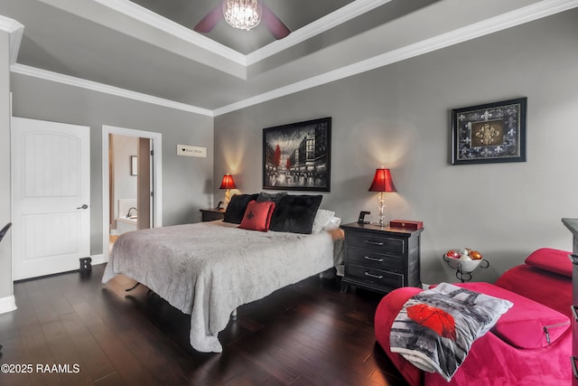 107 Ace Ln, Lafayette, LA 70506 - bedroom featuring a raised ceiling, dark wood-style floors, crown molding, and ensuite bathroom