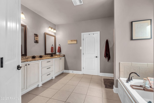 107 Ace Ln, Lafayette, LA 70506 - bathroom featuring double vanity, a garden tub, and tile patterned flooring