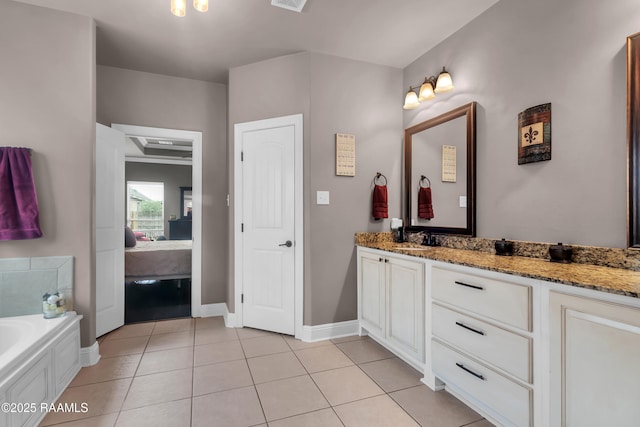 107 Ace Ln, Lafayette, LA 70506 - bathroom featuring tile patterned flooring, vanity, a bath, and ensuite bathroom