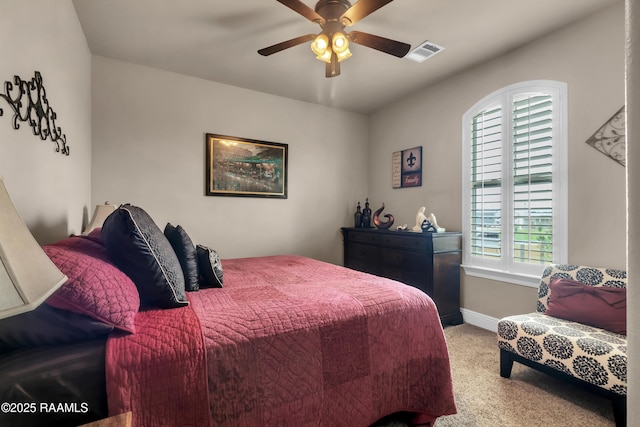 107 Ace Ln, Lafayette, LA 70506 - carpeted bedroom with a ceiling fan and baseboards