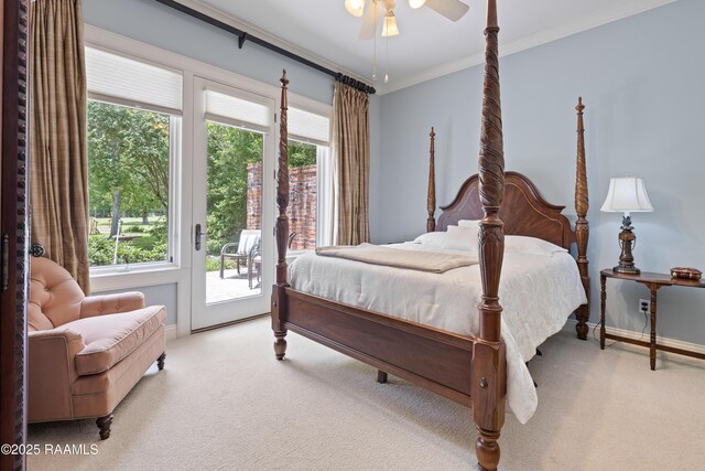 2822 Teal Dr, New Iberia, LA 70560 - carpeted bedroom with access to exterior, crown molding, and ceiling fan