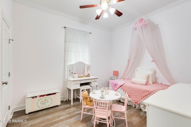 144 Cypress Cv, Youngsville, LA 70592 - bedroom featuring ornamental molding, wood finished floors, ceiling fan, and baseboards