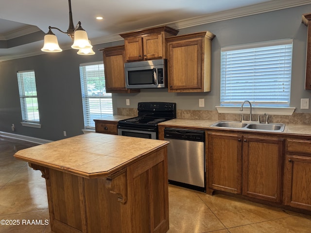 105 Ridge Run Ln, Carencro, LA 70520 - kitchen with appliances with stainless steel finishes, a sink, brown cabinetry, crown molding, and a chandelier