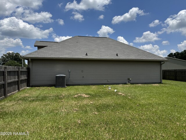 105 Ridge Run Ln, Carencro, LA 70520 - back of house with central AC and roof with shingles