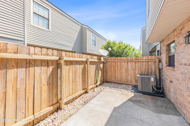 100 Winchester Dr Unit 308, Lafayette, LA 70506 - view of patio / terrace with cooling unit