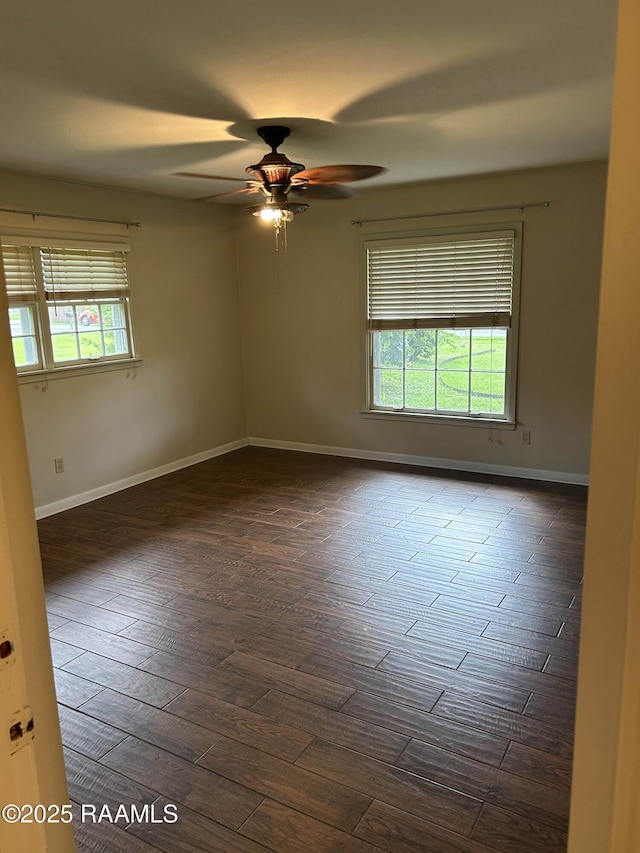 500 Brentwood Blvd, Lafayette, LA 70503 - empty room with baseboards, a ceiling fan, and dark wood-style floors
