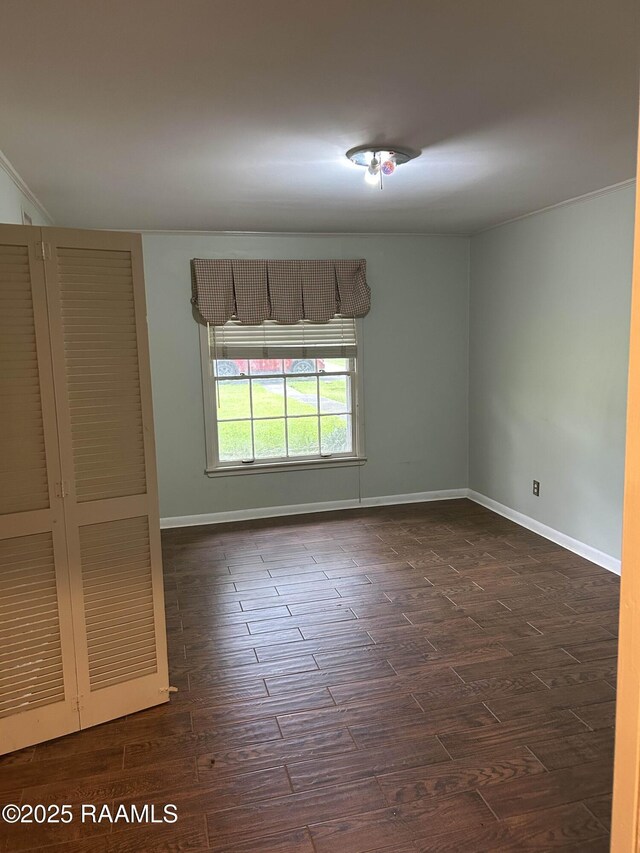 500 Brentwood Blvd, Lafayette, LA 70503 - empty room with dark wood finished floors and baseboards