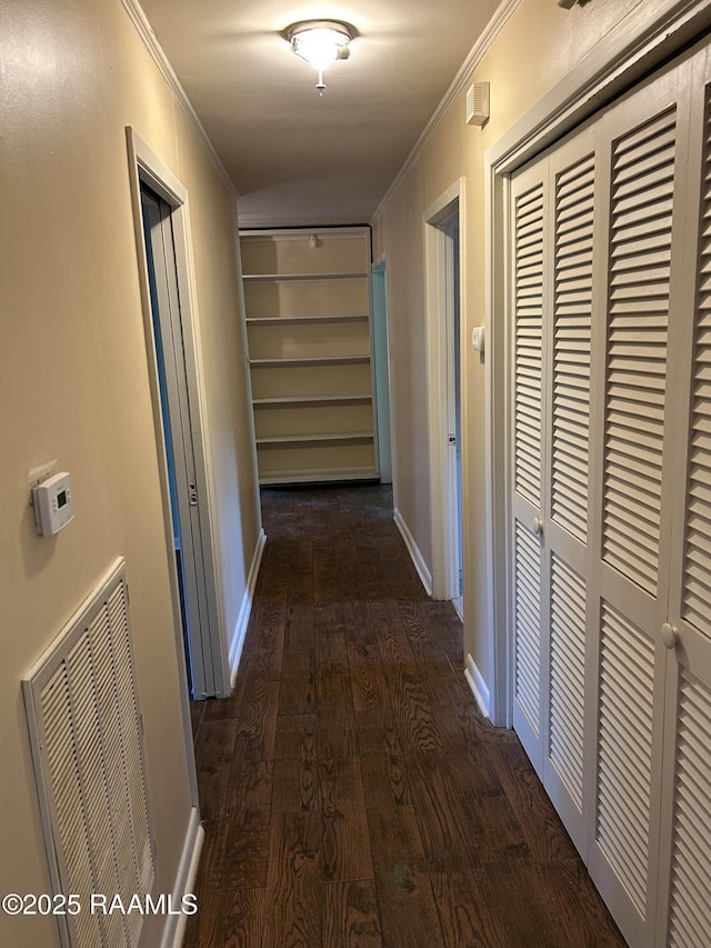 500 Brentwood Blvd, Lafayette, LA 70503 - hall featuring crown molding, dark wood-type flooring, and baseboards