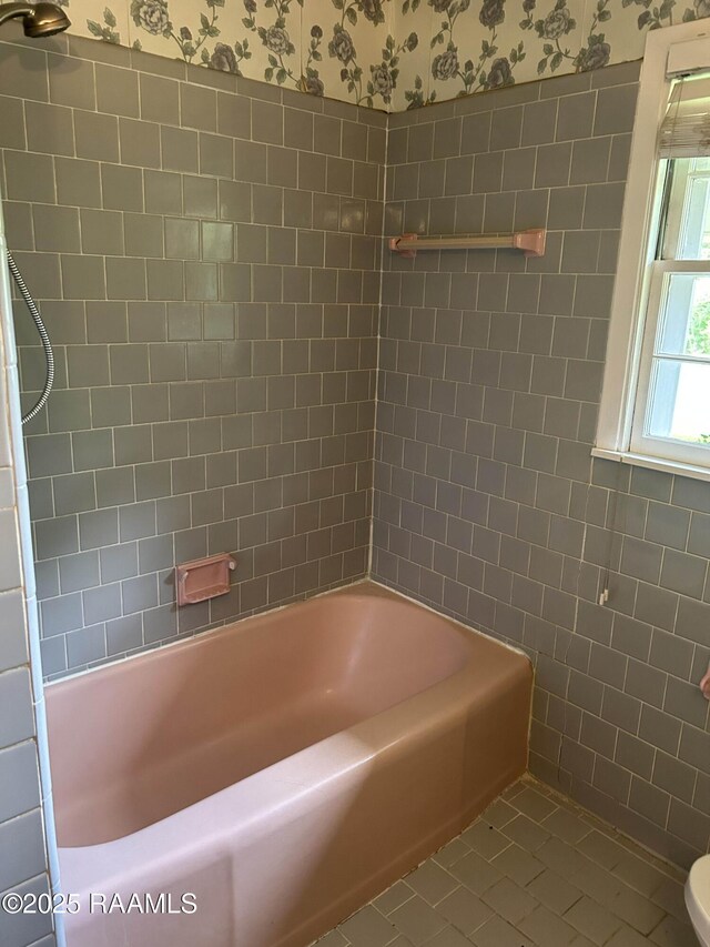 500 Brentwood Blvd, Lafayette, LA 70503 - full bathroom with wallpapered walls,  shower combination, and toilet