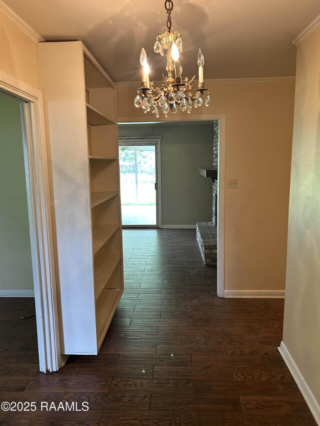 500 Brentwood Blvd, Lafayette, LA 70503 - corridor featuring a chandelier, ornamental molding, dark wood finished floors, and baseboards