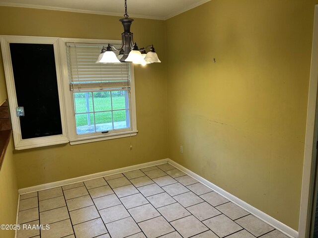 500 Brentwood Blvd, Lafayette, LA 70503 - unfurnished dining area with a chandelier, baseboards, light tile patterned flooring, and ornamental molding