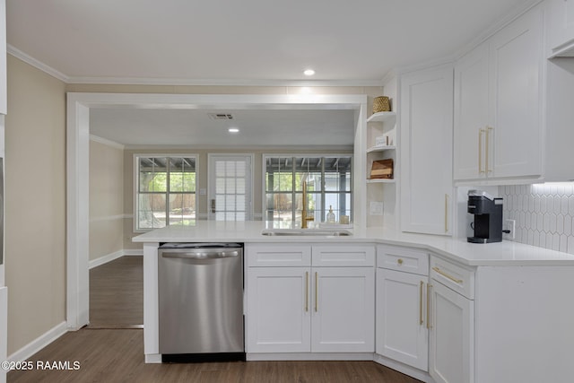 178 Bertrand Rd, Opelousas, LA 70570 - kitchen featuring dishwasher, white cabinetry, a peninsula, light countertops, and dark wood-style flooring