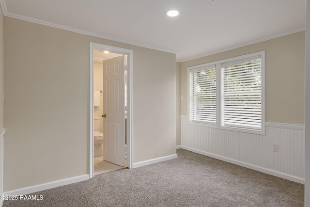 178 Bertrand Rd, Opelousas, LA 70570 - carpeted spare room with crown molding, wainscoting, and recessed lighting