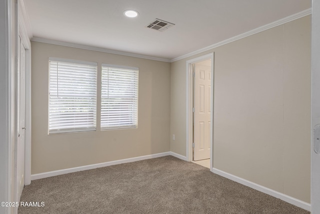178 Bertrand Rd, Opelousas, LA 70570 - empty room featuring carpet, crown molding, and baseboards