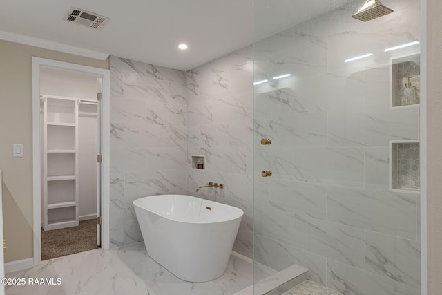 178 Bertrand Rd, Opelousas, LA 70570 - full bath featuring a walk in closet, a freestanding tub, marble finish floors, a marble finish shower, and recessed lighting