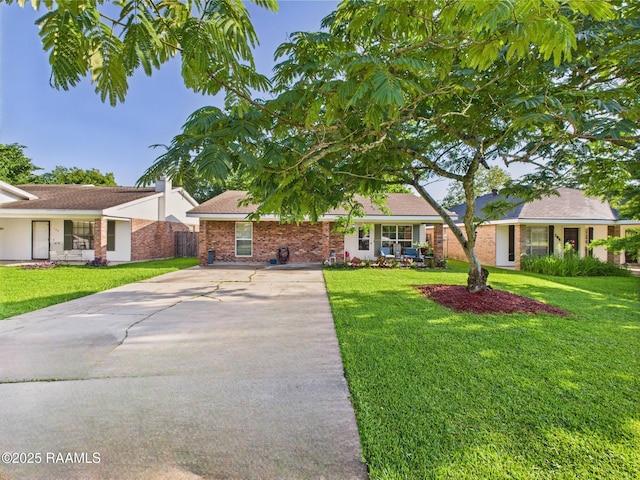 106 Cheticamp Dr, Lafayette, LA 70508 - view of front of home with driveway and brick siding