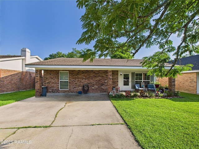 106 Cheticamp Dr, Lafayette, LA 70508 - ranch-style home featuring a front yard and brick siding