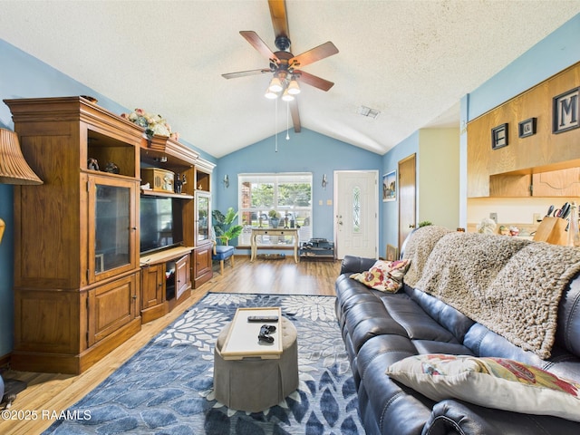 106 Cheticamp Dr, Lafayette, LA 70508 - living area with a ceiling fan, wood finished floors, and a textured ceiling