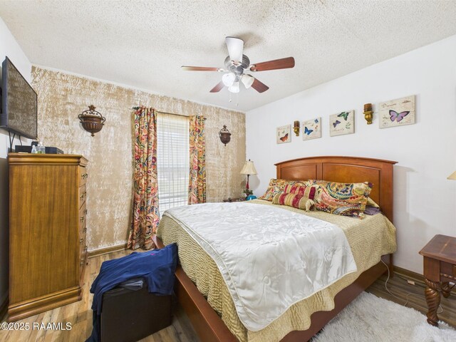 106 Cheticamp Dr, Lafayette, LA 70508 - bedroom featuring a textured ceiling and ceiling fan