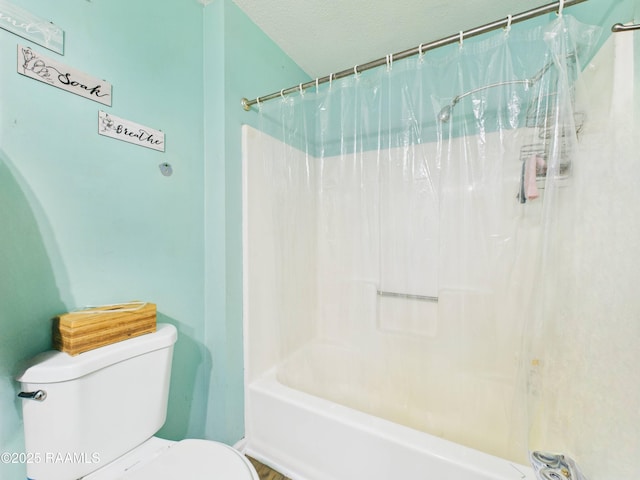 106 Cheticamp Dr, Lafayette, LA 70508 - bathroom featuring shower / bath combo and a textured ceiling