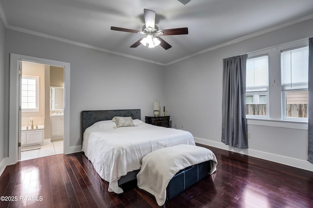 108 Trotter St, New Iberia, LA 70563 - bedroom with multiple windows, wood-type flooring, baseboards, crown molding, and ensuite bathroom