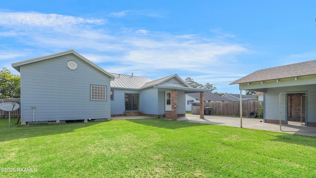 108 Trotter St, New Iberia, LA 70563 - back of property featuring a patio area