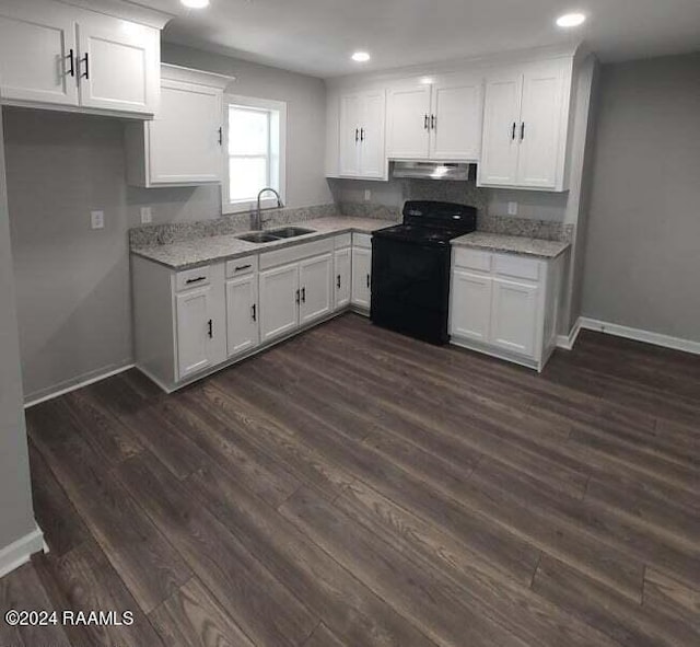400 S Granger St, Erath, LA 70533 - kitchen with black range oven, a sink, range hood, white cabinetry, and recessed lighting