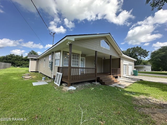 6033 Perry Ln, Lake Charles, LA 70605 - view of front of home with covered porch and a front yard