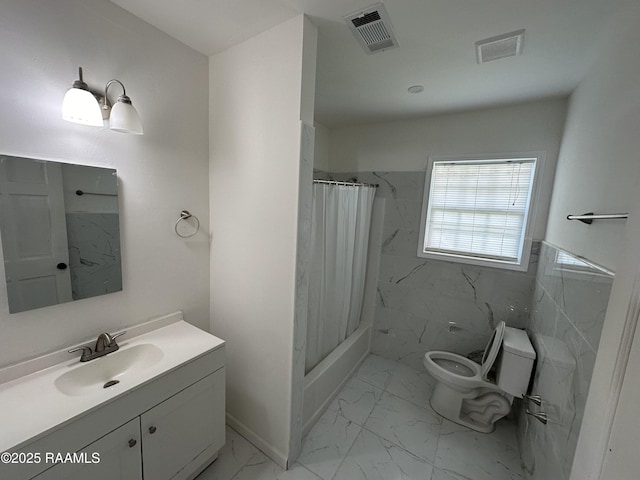 6033 Perry Ln, Lake Charles, LA 70605 - bathroom featuring marble finish floors, toilet, vanity, and shower / bath combination with curtain