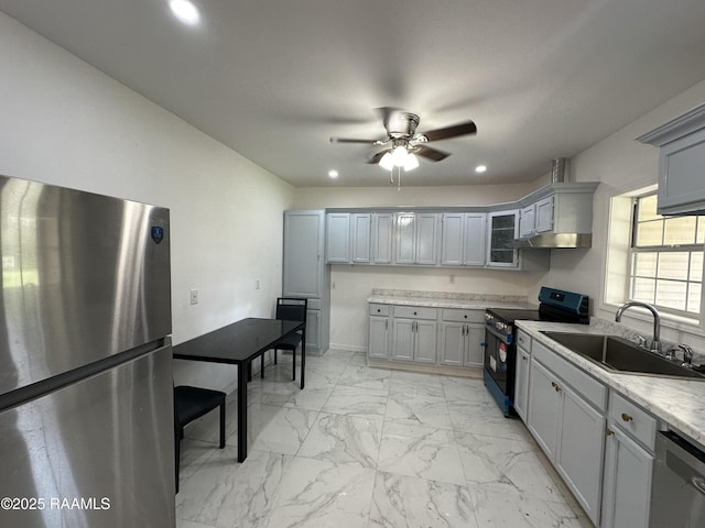 6033 Perry Ln, Lake Charles, LA 70605 - kitchen with stainless steel appliances, a sink, ceiling fan, light marble finish floors, and recessed lighting