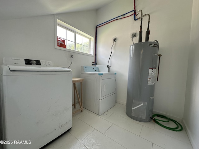 6033 Perry Ln, Lake Charles, LA 70605 - laundry room featuring washing machine and clothes dryer, water heater, and baseboards