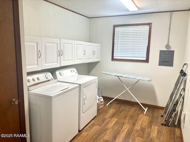 930 N 7th St, Eunice, LA 70535 - laundry area with independent washer and dryer, cabinet space, dark wood-type flooring, electric panel, and baseboards
