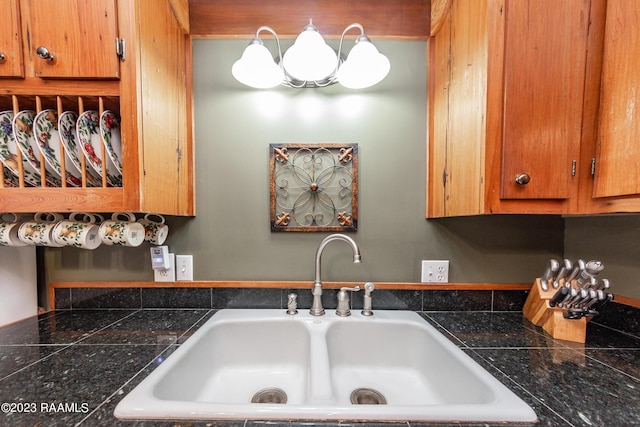 2944 Main Hwy, Breaux Bridge, LA 70517 - kitchen view of a sink and brown cabinetry