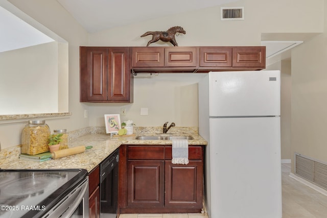 213 Marilyn Dr, Lafayette, LA 70503 - kitchen featuring freestanding refrigerator, a sink, stainless steel range with electric stovetop, dishwasher, and light stone countertops