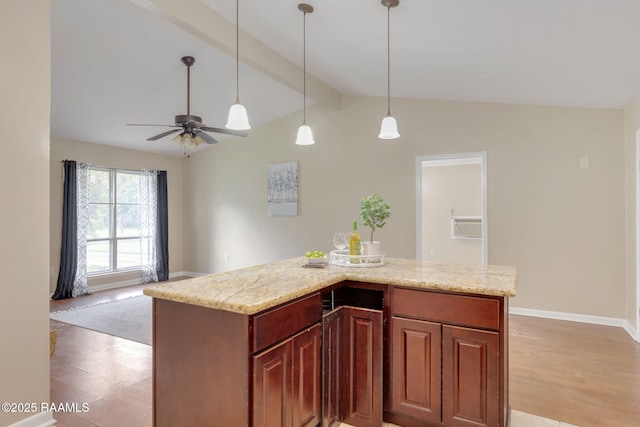 213 Marilyn Dr, Lafayette, LA 70503 - kitchen with light wood-style flooring, decorative light fixtures, baseboards, ceiling fan, and open floor plan