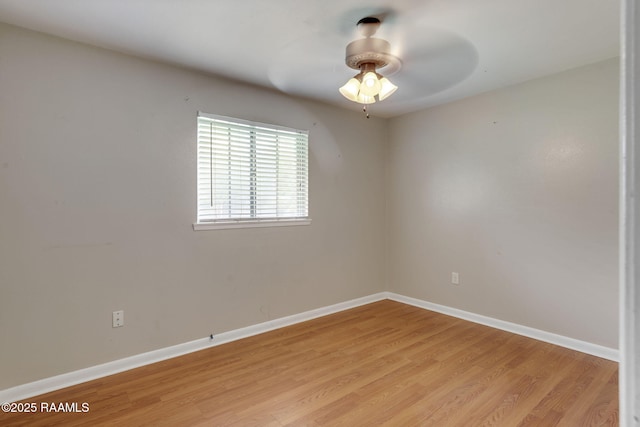 213 Marilyn Dr, Lafayette, LA 70503 - spare room featuring light wood-style floors, baseboards, and ceiling fan