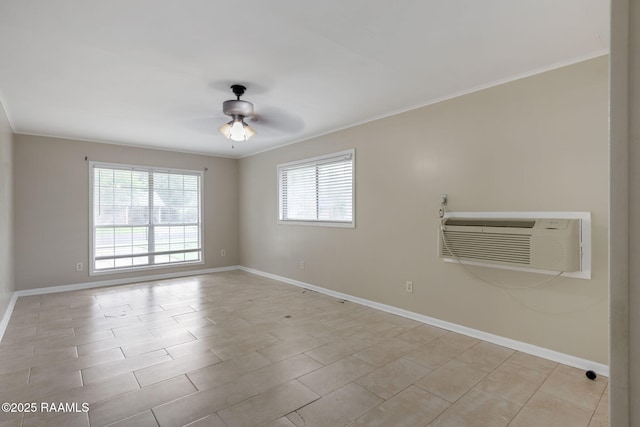213 Marilyn Dr, Lafayette, LA 70503 - spare room featuring crown molding, a ceiling fan, a wall mounted air conditioner, and baseboards