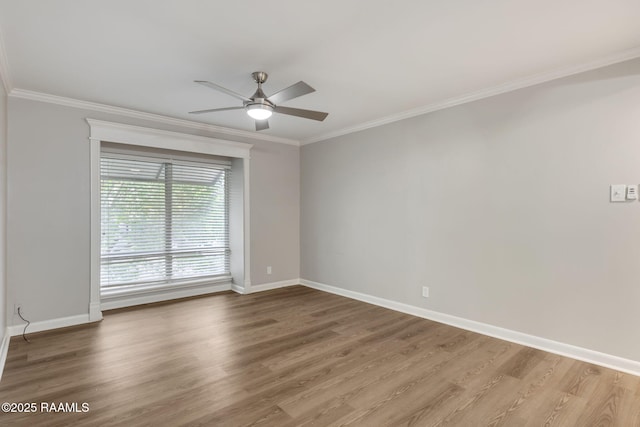 220 Doucet Rd Unit 230D, Lafayette, LA 70506 - spare room featuring wood finished floors, crown molding, and a ceiling fan