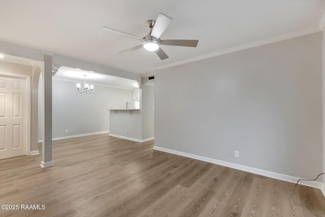 220 Doucet Rd Unit 230D, Lafayette, LA 70506 - unfurnished living room with ornamental molding, a chandelier, light wood finished floors, and ceiling fan