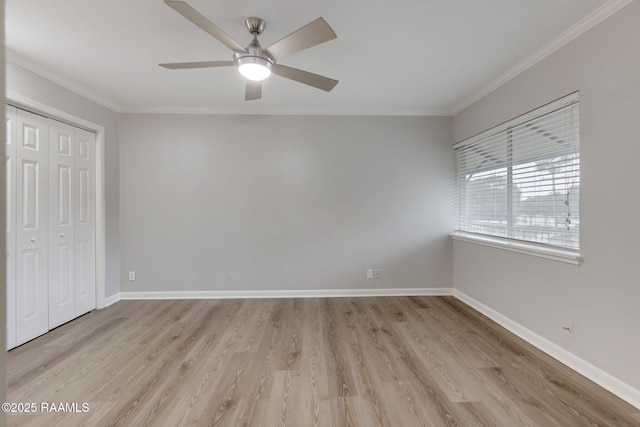 220 Doucet Rd Unit 230D, Lafayette, LA 70506 - unfurnished bedroom featuring wood finished floors, ornamental molding, a closet, and ceiling fan