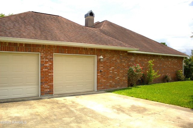 101 David St, Breaux Bridge, LA 70517 - view of side of property featuring driveway, brick siding, and roof with shingles