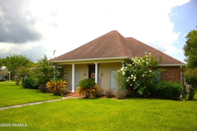 101 David St, Breaux Bridge, LA 70517 - view of front of house with a front lawn and a shingled roof
