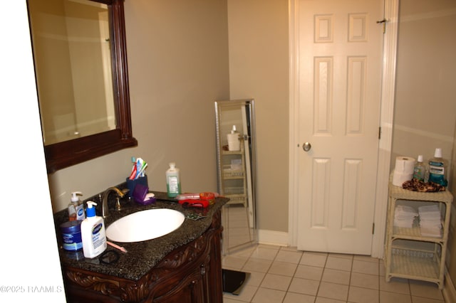 101 David St, Breaux Bridge, LA 70517 - bathroom featuring tile patterned floors and vanity