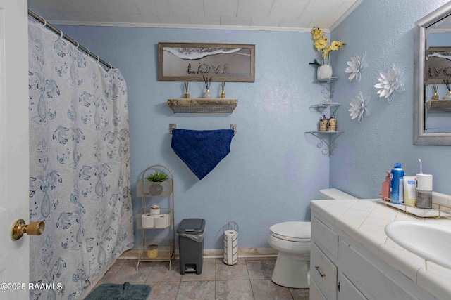 617 Sidney Dr, Breaux Bridge, LA 70517 - bathroom with ornamental molding, toilet, vanity, tile patterned flooring, and a shower with shower curtain