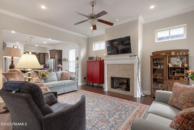 109 Abilene Ln, Lafayette, LA 70507 - living room featuring dark wood finished floors, a ceiling fan, baseboards, recessed lighting, and a tiled fireplace