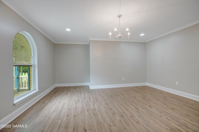 5811 Basile Eunice Hwy, Eunice, LA 70535 - unfurnished room with a chandelier, light wood-style floors, crown molding, baseboards, and recessed lighting