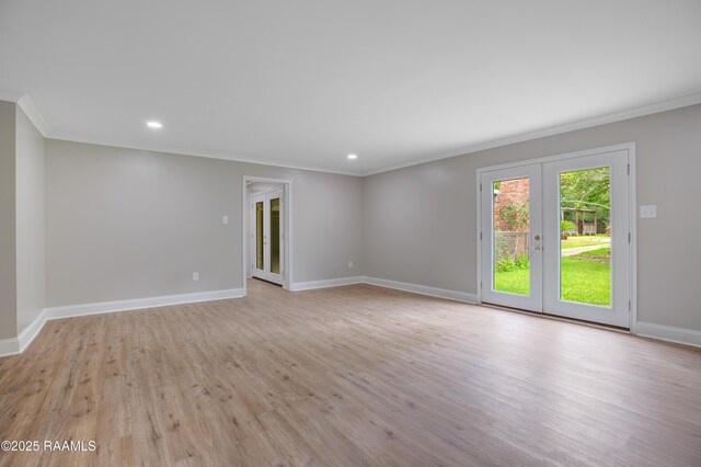 5811 Basile Eunice Hwy, Eunice, LA 70535 - empty room with crown molding, french doors, recessed lighting, light wood finished floors, and baseboards