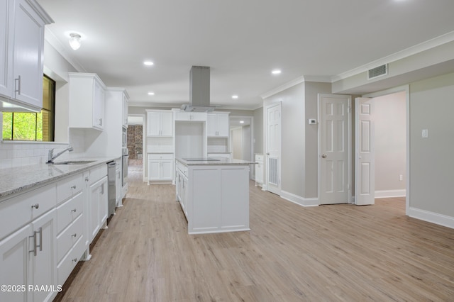 5811 Basile Eunice Hwy, Eunice, LA 70535 - kitchen with island range hood, crown molding, a sink, decorative backsplash, and dishwasher