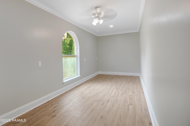 5811 Basile Eunice Hwy, Eunice, LA 70535 - spare room featuring ceiling fan, crown molding, baseboards, and light wood finished floors