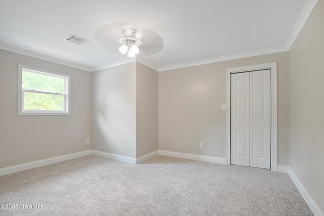 5811 Basile Eunice Hwy, Eunice, LA 70535 - spare room with a ceiling fan, ornamental molding, light carpet, and baseboards